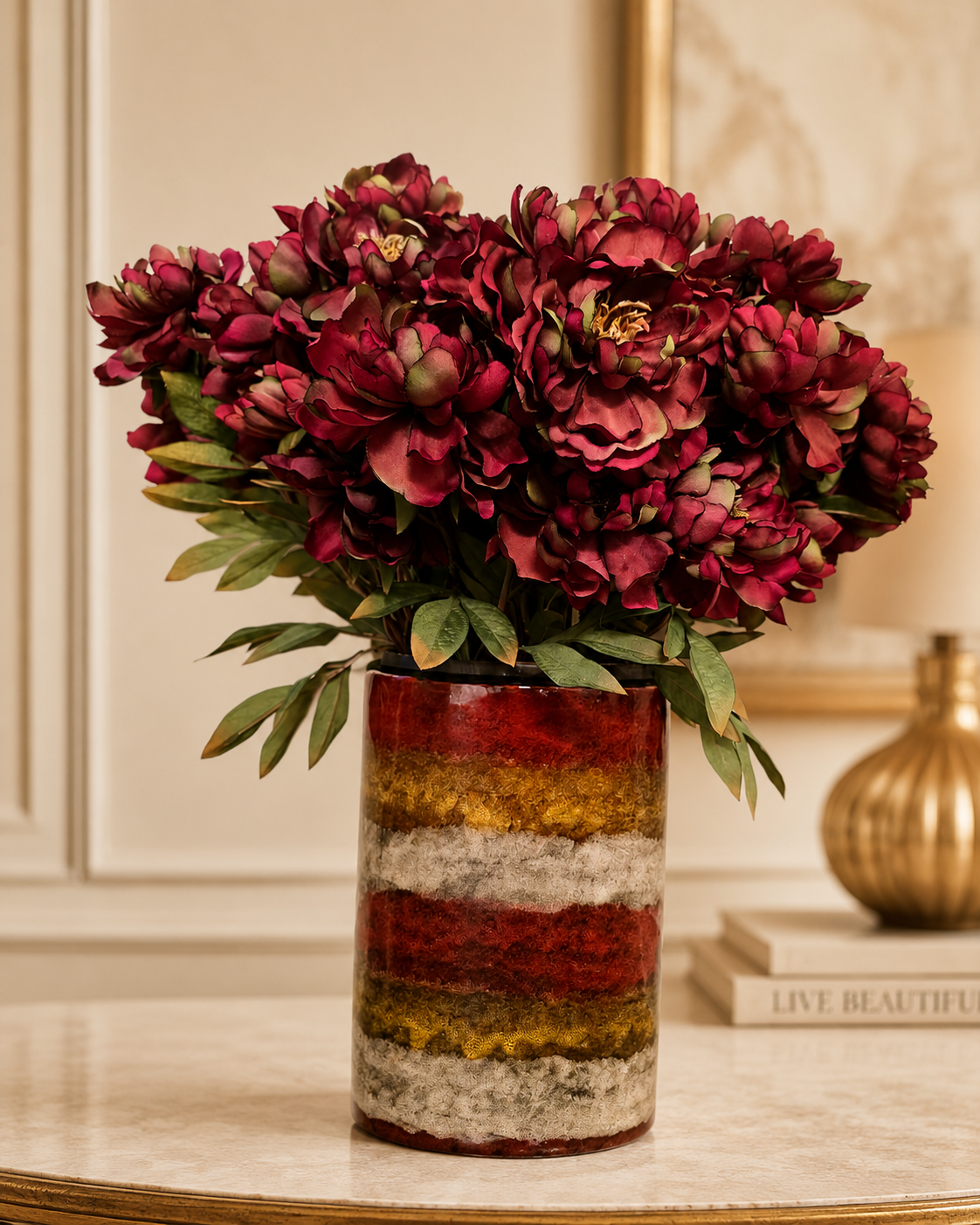 Burgundy Floral Arrangement in Striped Glass Vase